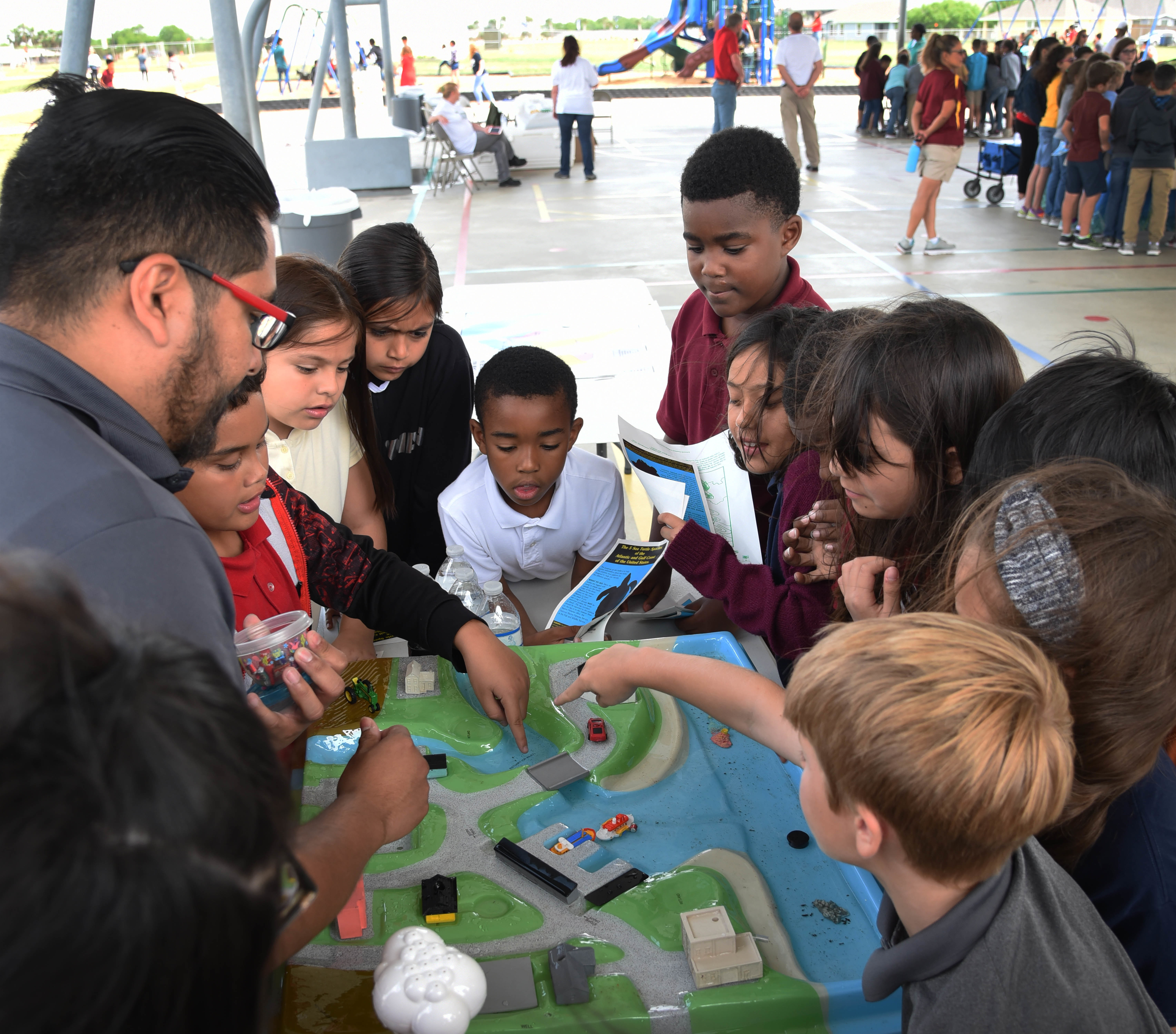 SME educating students on how animal waste and garbage (pollution) can be hazardous to our local water sources, including ground water, storm water and drinking water 